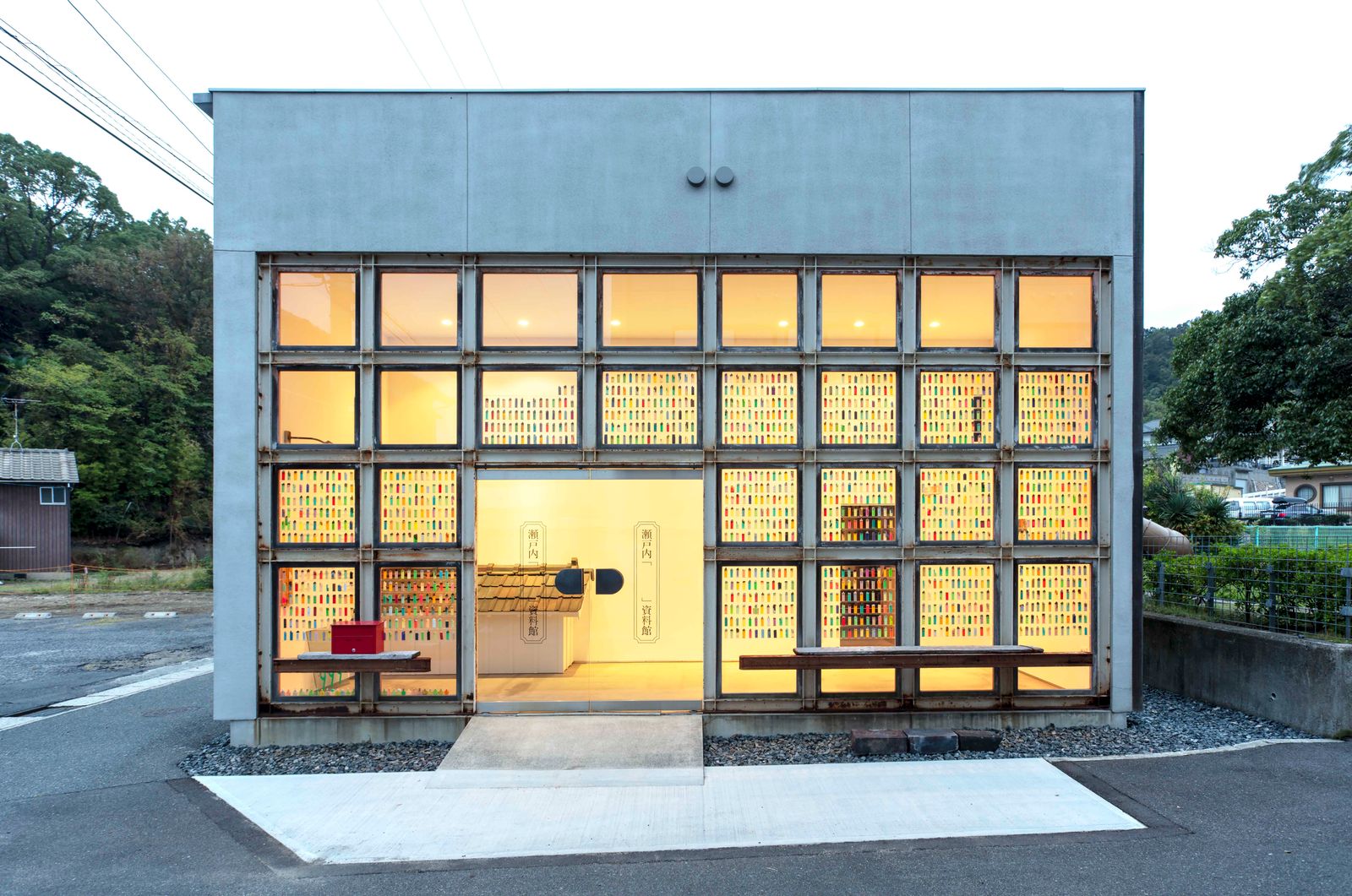 Minimalist concrete architecture building characterized by sharp lines and modern geometric design.