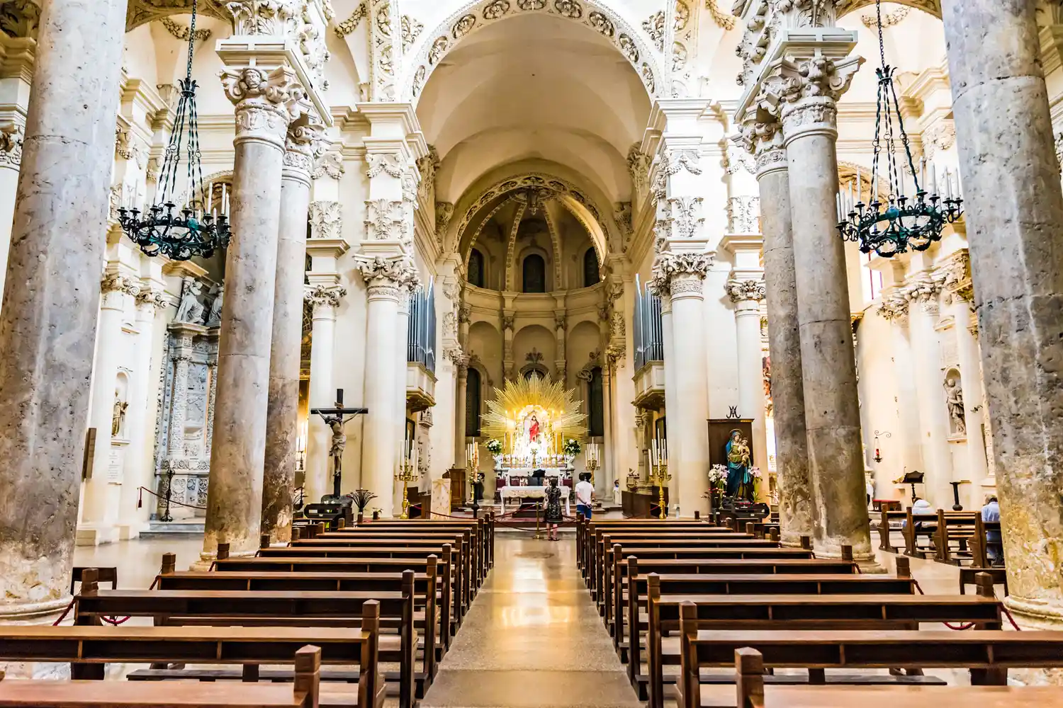Intricate architectural details of the interior of the Basilica di Santa Croce in Lecce.