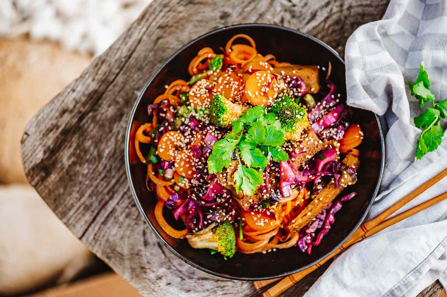 A modern, artistically plated vegan meal showcasing fresh New Zealand produce.