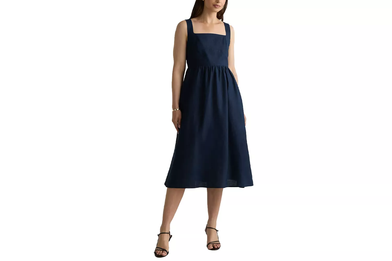 A white 100 percent European linen fit and flare midi dress.