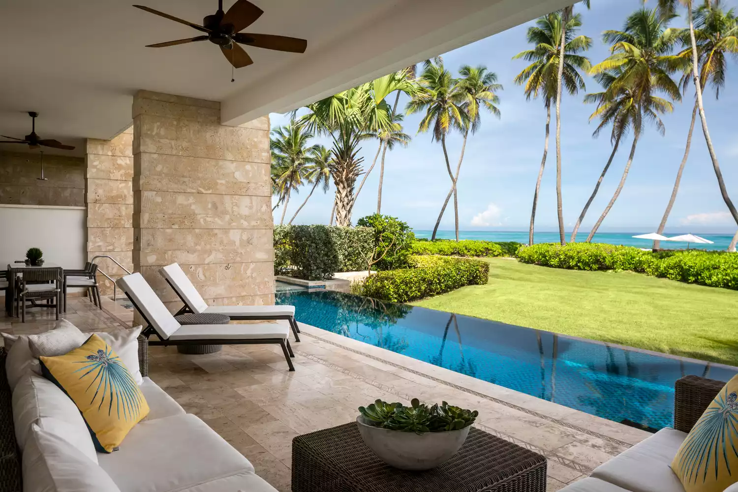 Luxury guest suite at Dorado Beach featuring a private infinity pool with views of the tropical coastline.