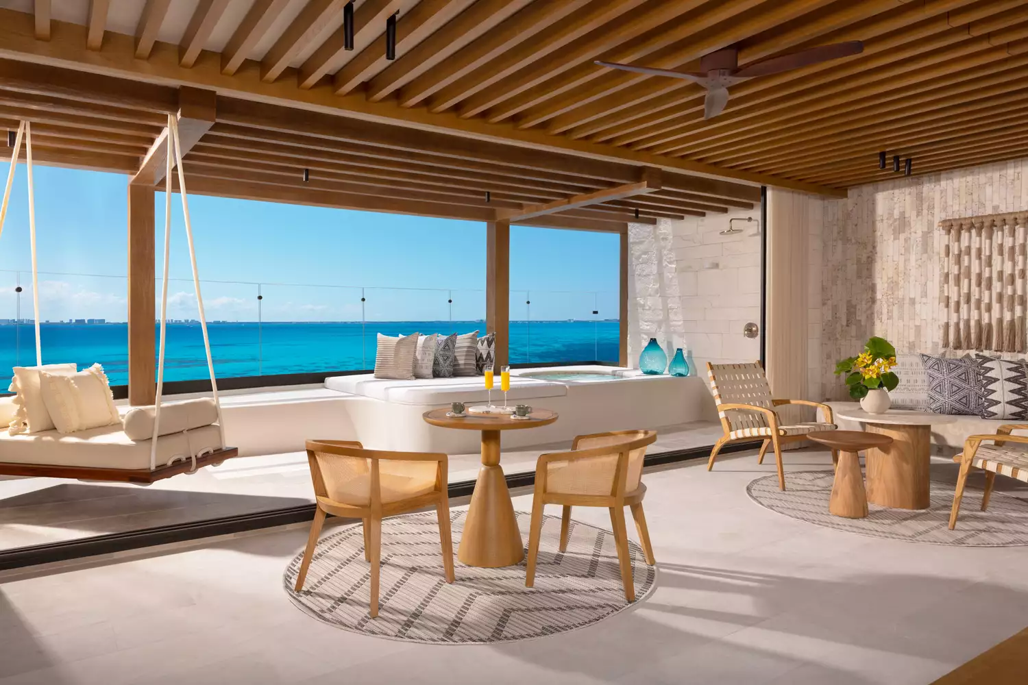 Modern and airy guest suite interior at Impression Isla Mujeres by Secrets.