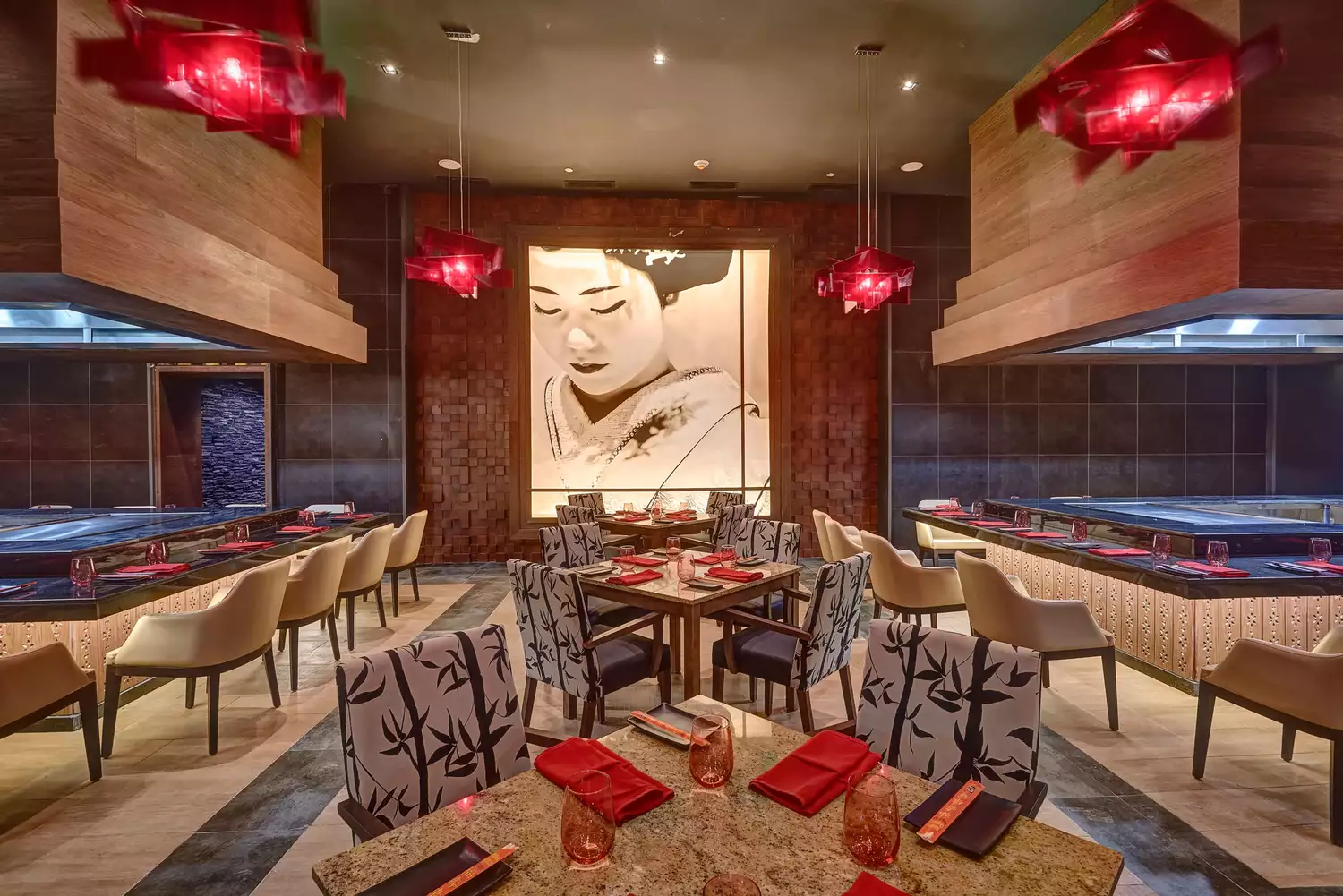 Modern interior of a luxury restaurant at Royalton Negril with elegant lighting and decor.