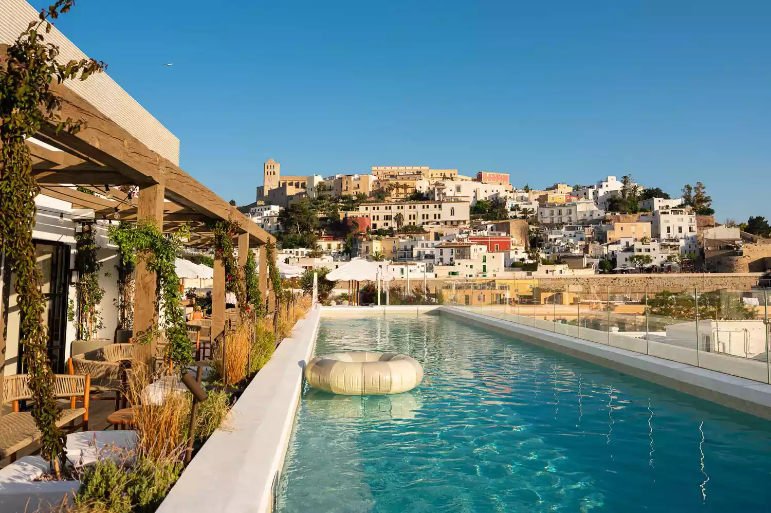 Rooftop pool deck with panoramic views from The Standard Ibiza, illustrating the brand's signature outdoor social design.