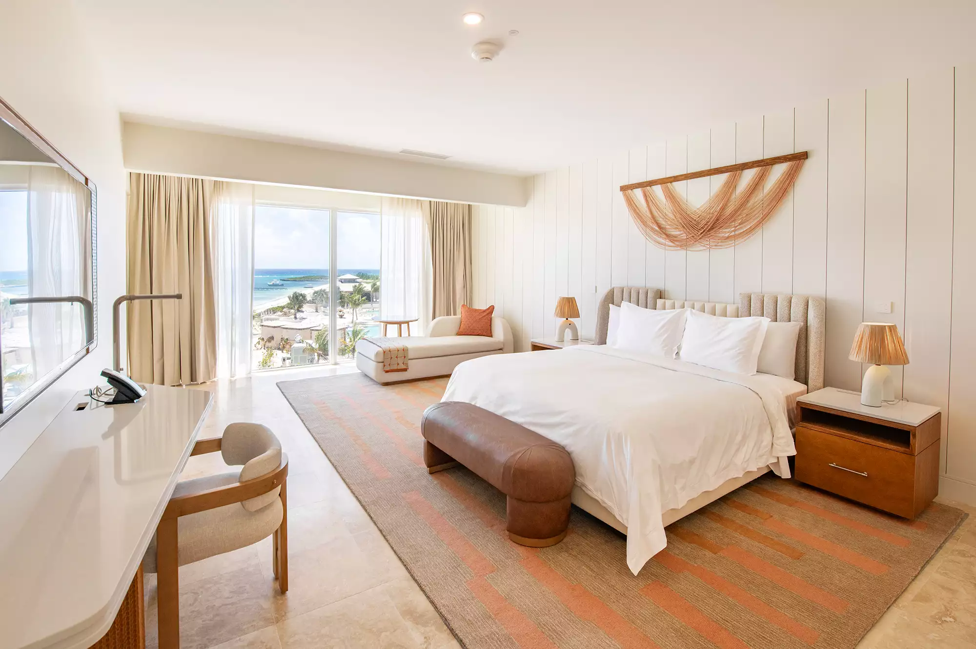 Interior view of a luxury ocean-facing bedroom at Salterra.
