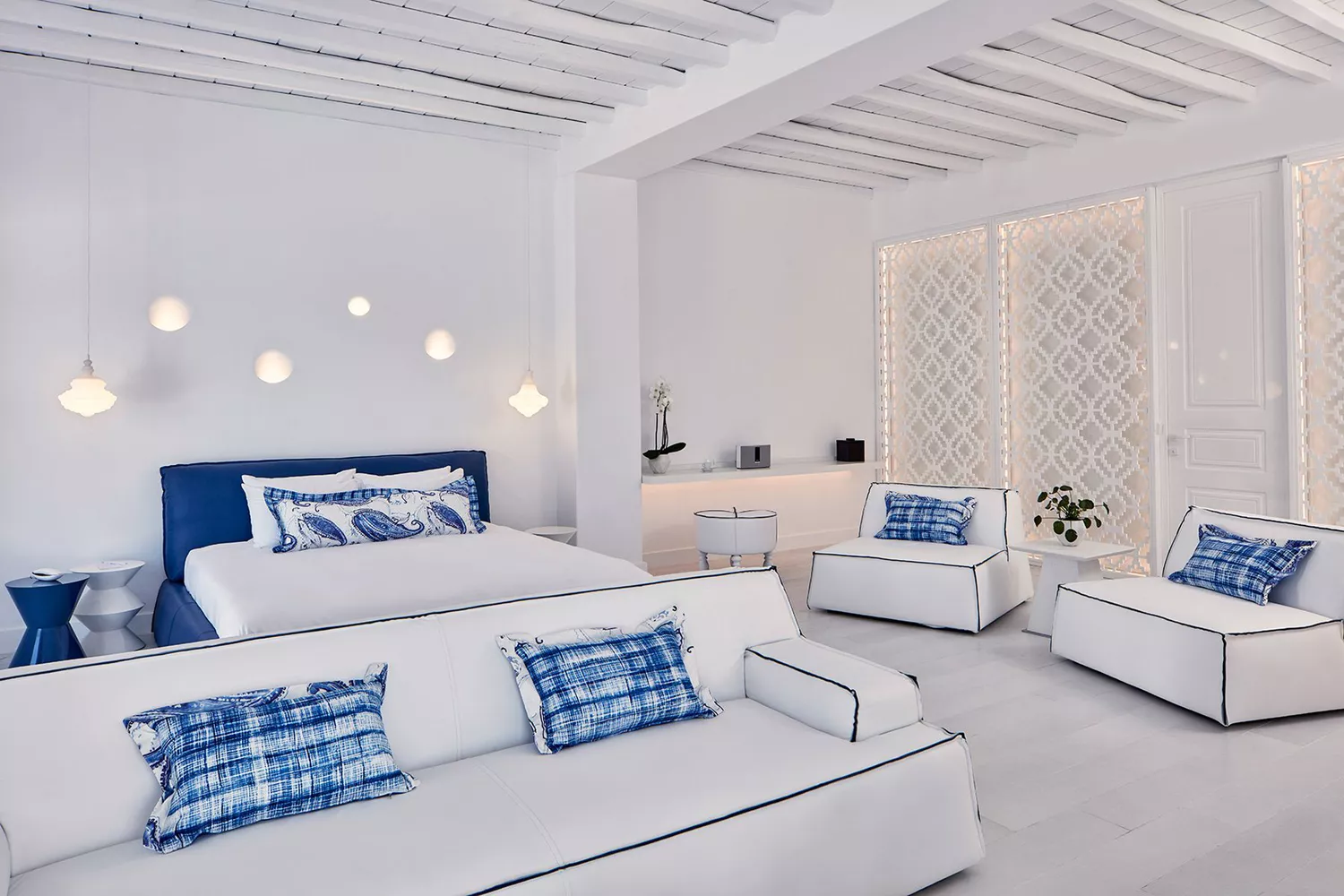 Minimalist white interior of a luxury guest room at Katikies Mykonos.
