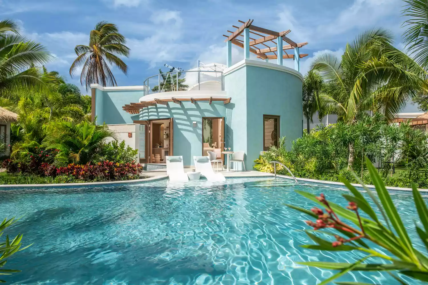 A luxury private villa at Sandals Dunn's River in Ocho Rios featuring contemporary architecture.