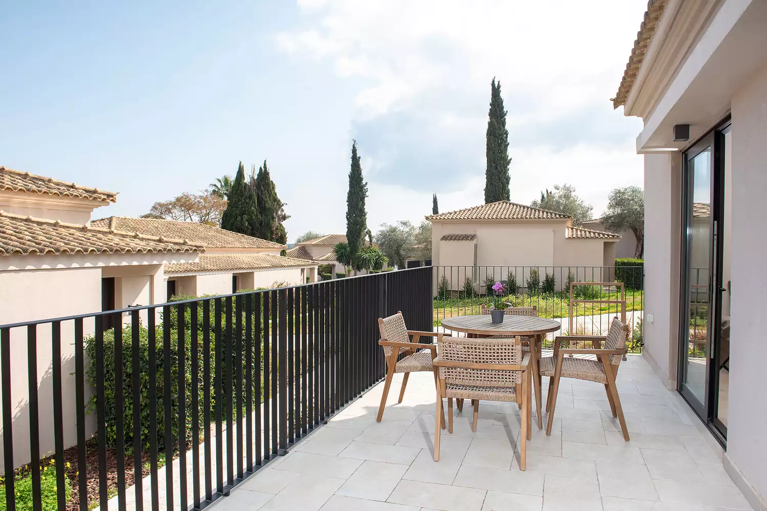 A guest room terrace overlooking the Mediterranean at Dreams Corfu Resort & Spa.