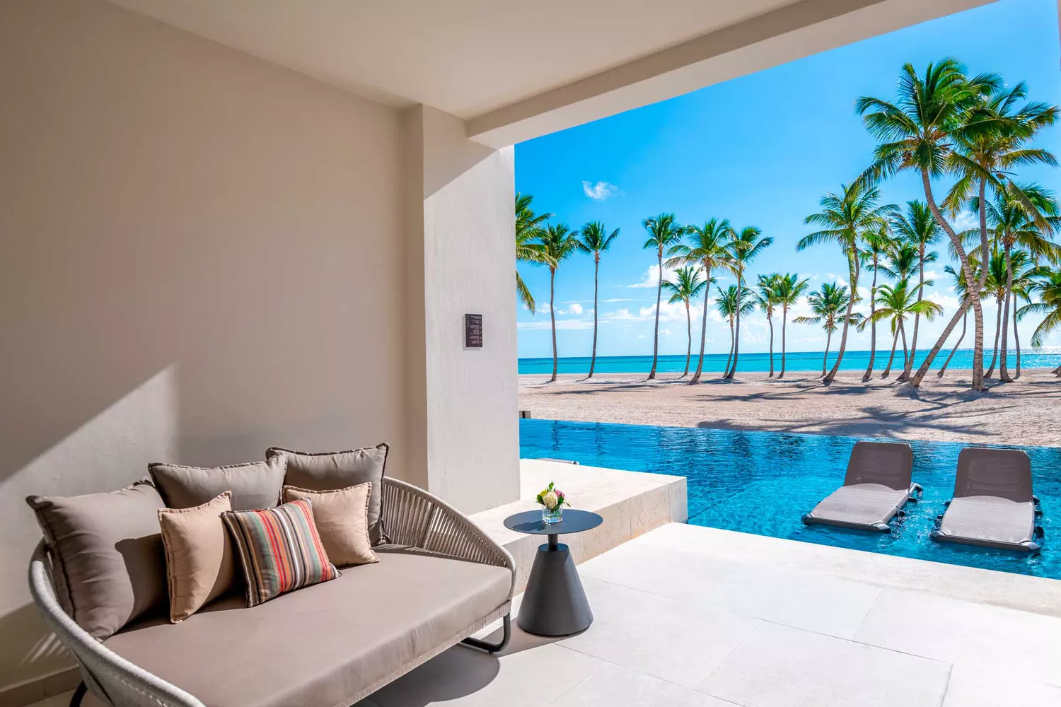 Exterior view of the Hyatt Zilara resort grounds near the ocean.