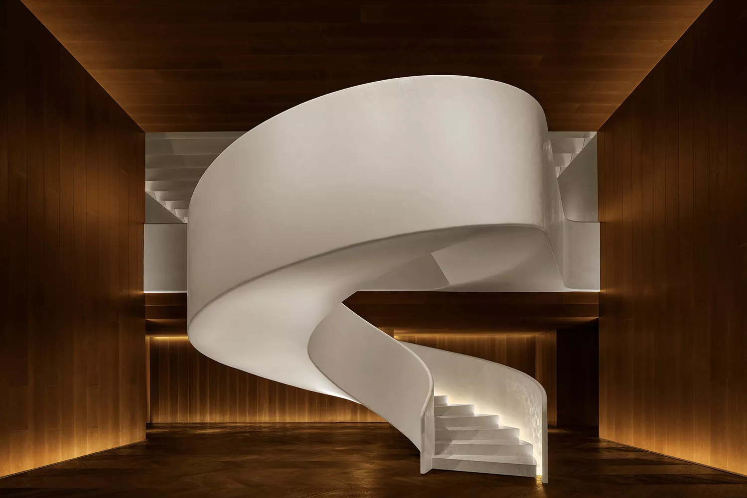 The sculptural white spiral staircase designed by John Pawson at The Madrid EDITION.