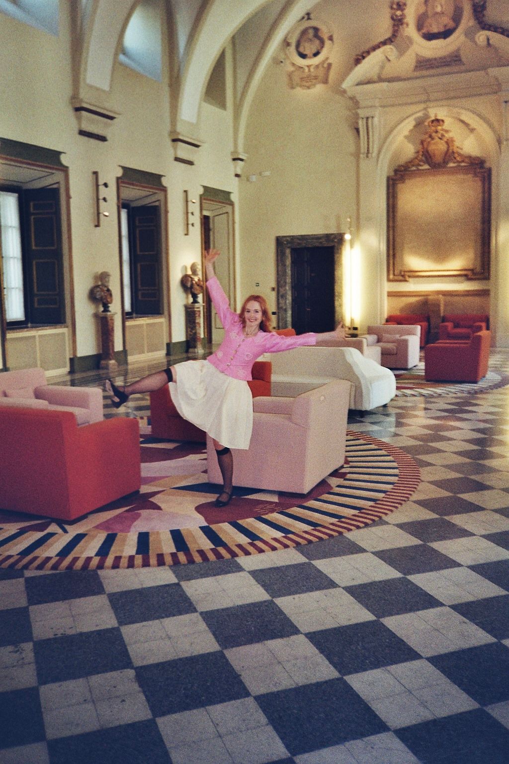 A luxurious and modern living room interior of a boutique Italian hotel.