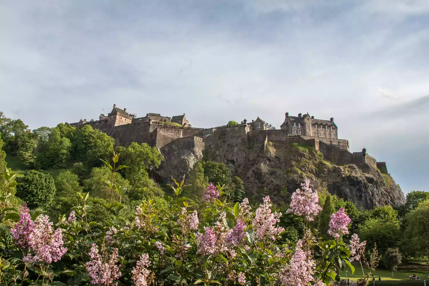 The massive stone walls of Edinburgh Castle overlooking the city from Castle Rock.