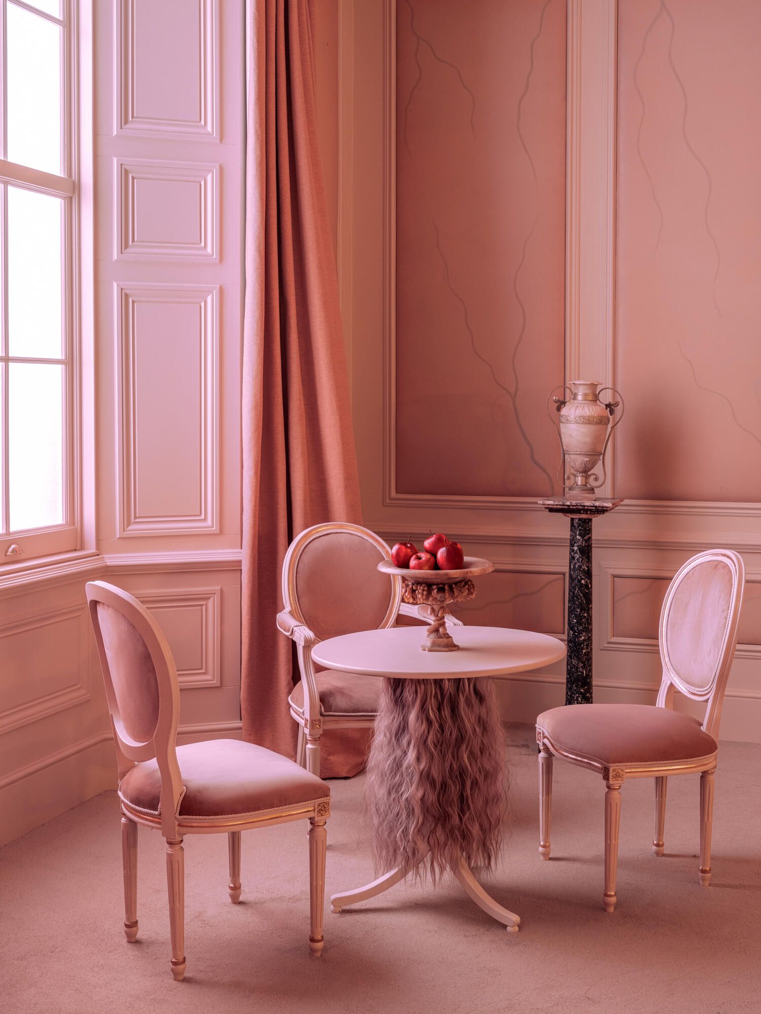 The grand dining room at Holdsworth House with wood-paneled walls and set dining tables.