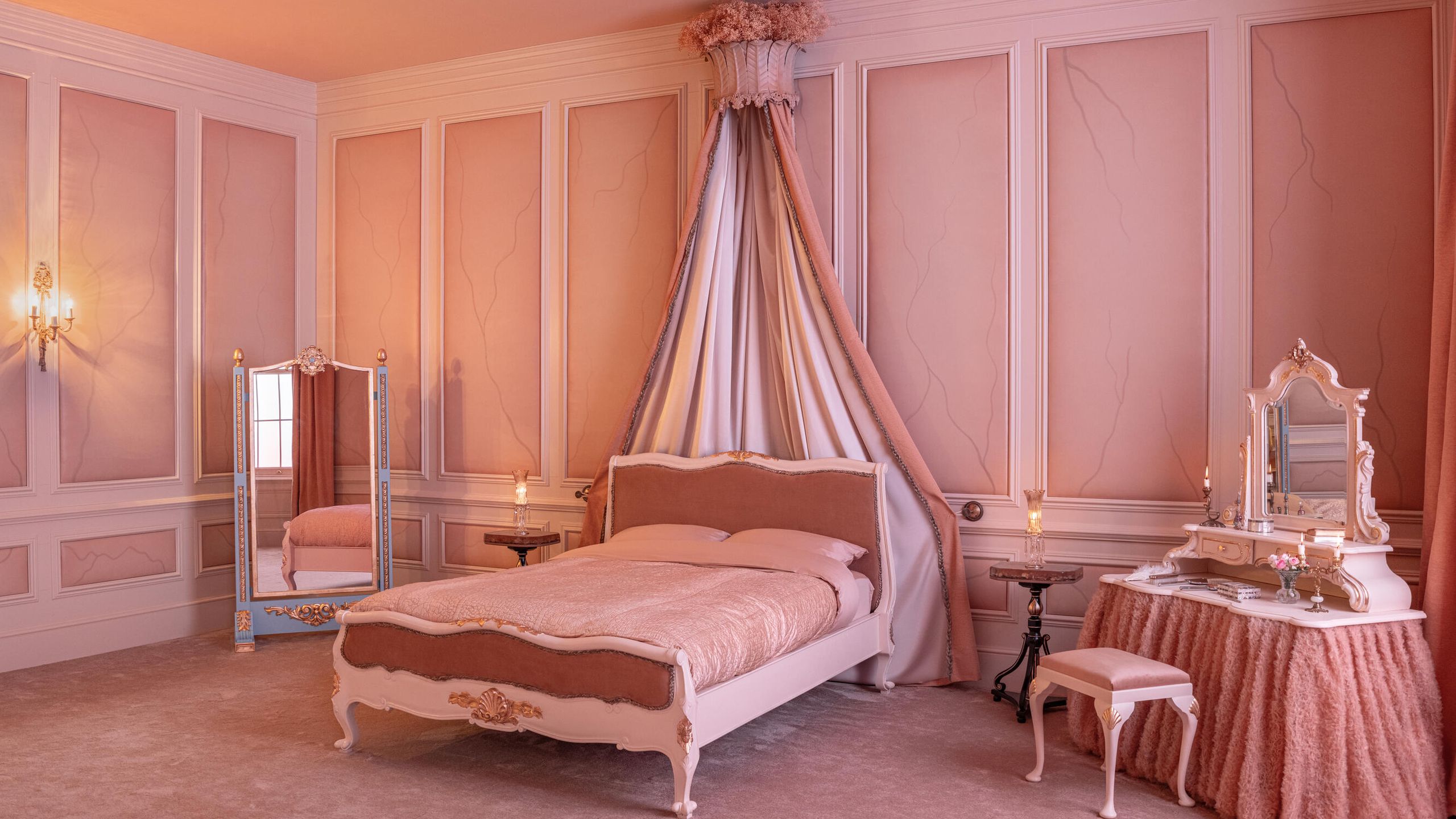 The interior of the Catherine Earnshaw bedroom at Holdsworth House with a large bed and period-specific decor.