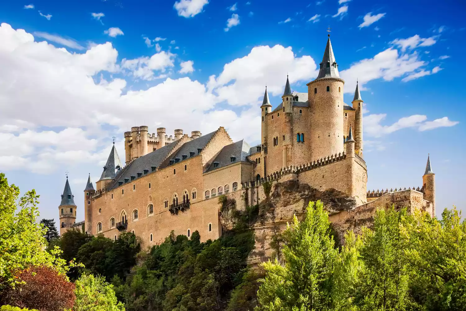 The Alcázar of Segovia with its distinct pointed towers resembling a ship's bow.