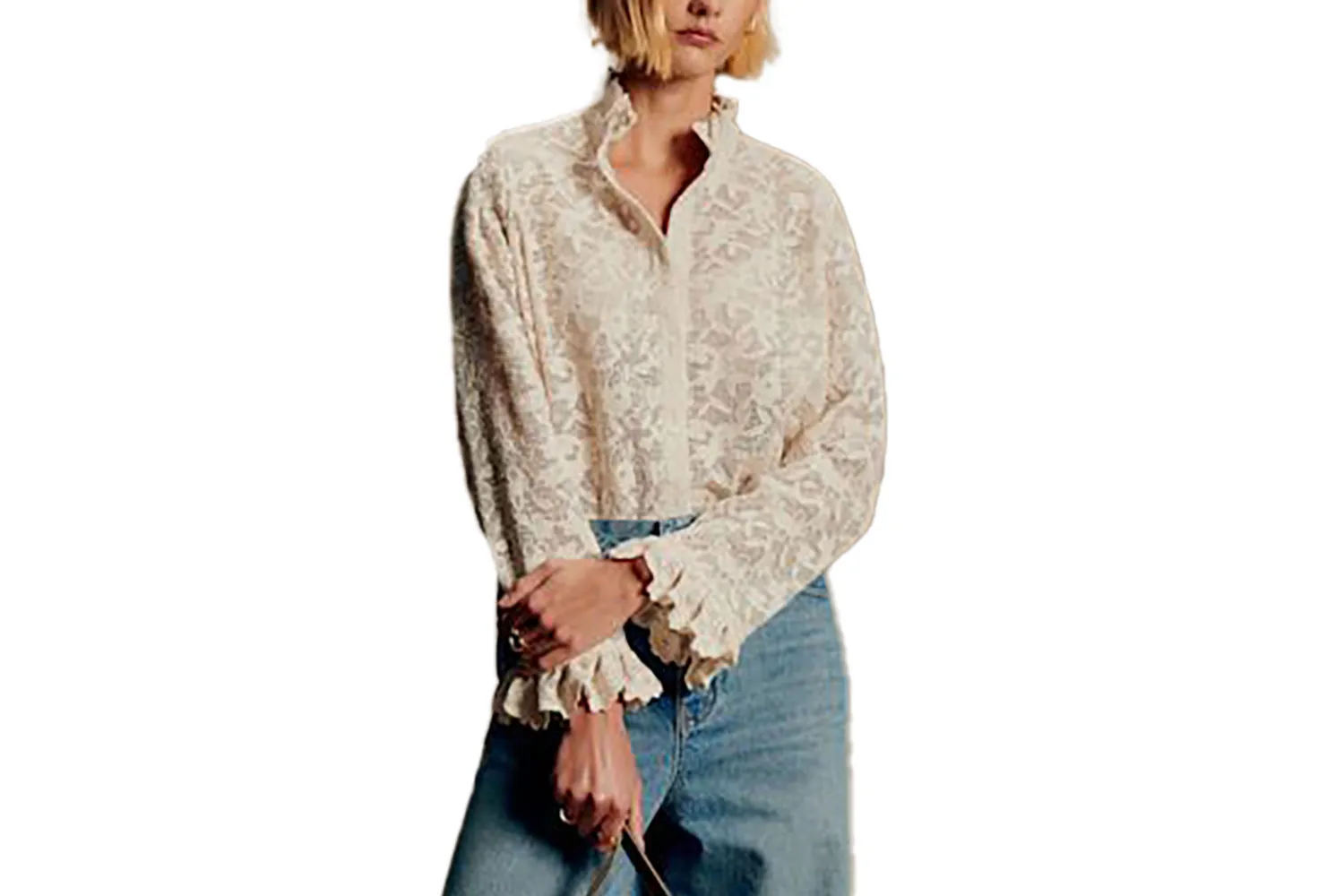 Cream-colored button-up shirt with floral lace detailing.