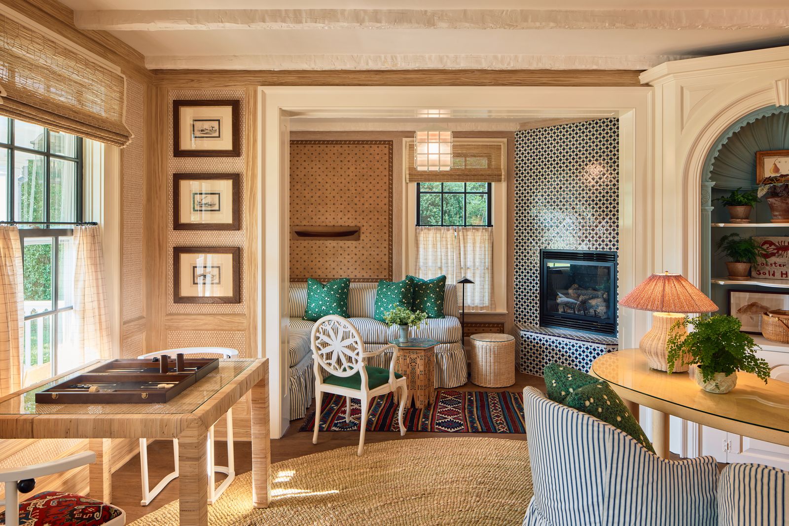 Close-up of a boutique hotel interior with curated cushions, rugs, and architectural details.