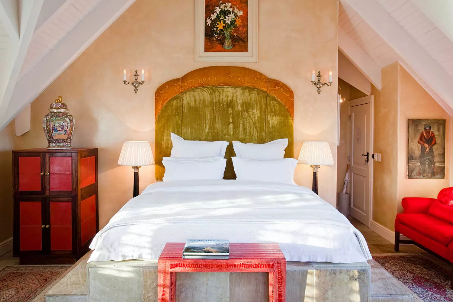 Elegant guest room at Birkenhead House featuring white linens and coastal-inspired luxury decor.