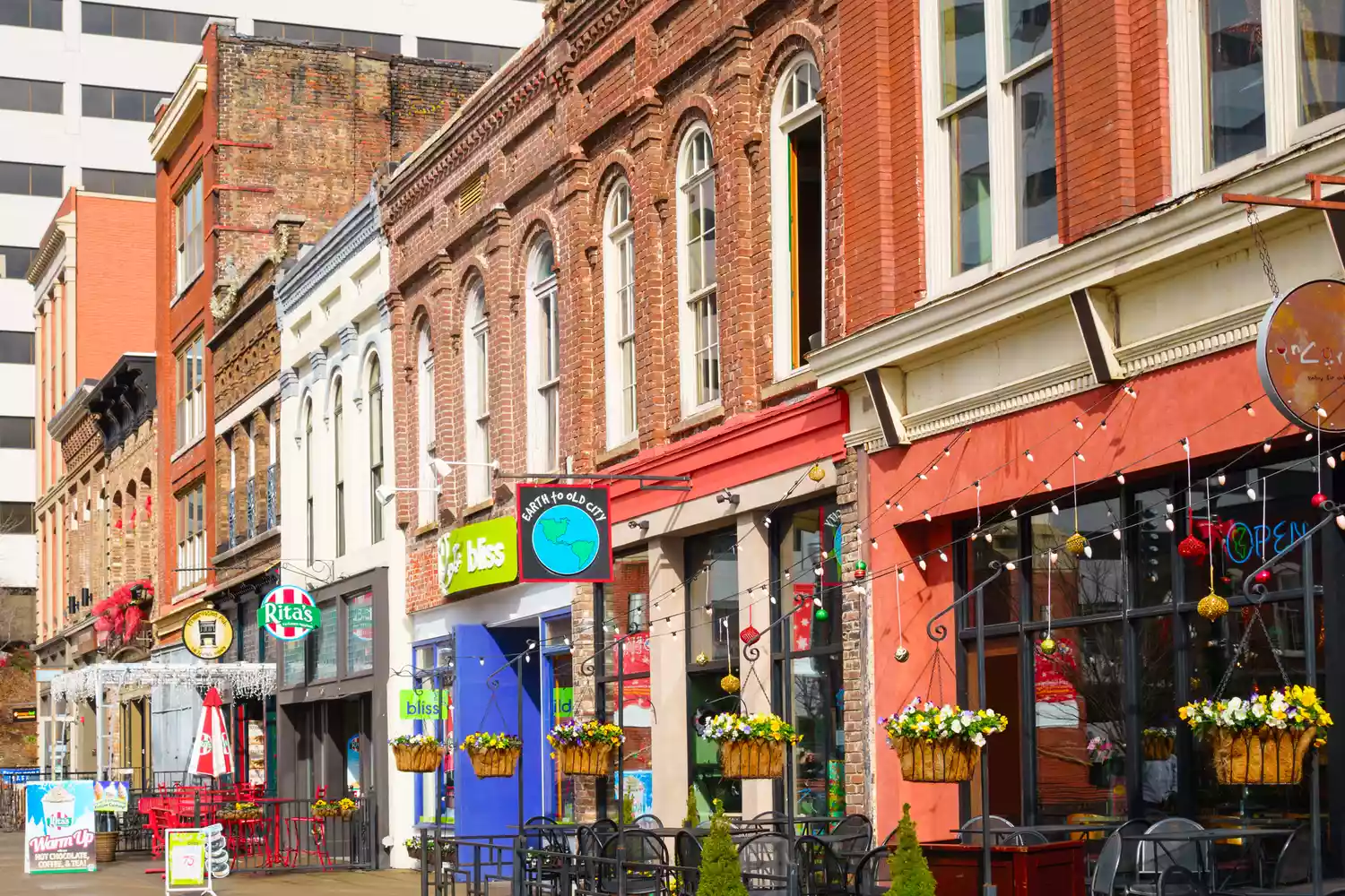 Colorful storefronts and restaurants in downtown Knoxville's Market Square.