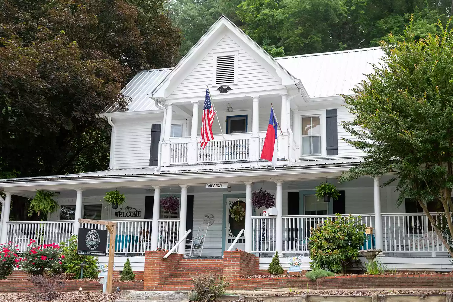 The exterior of the historic Whistle Stop Inn in Dillsboro, North Carolina.