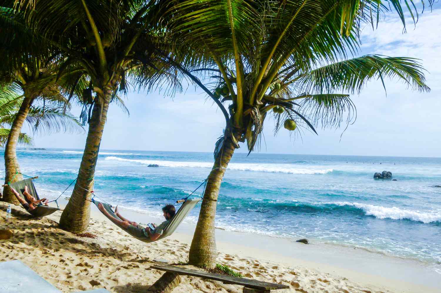 A workspace setup with a view of the beach in Sri Lanka.